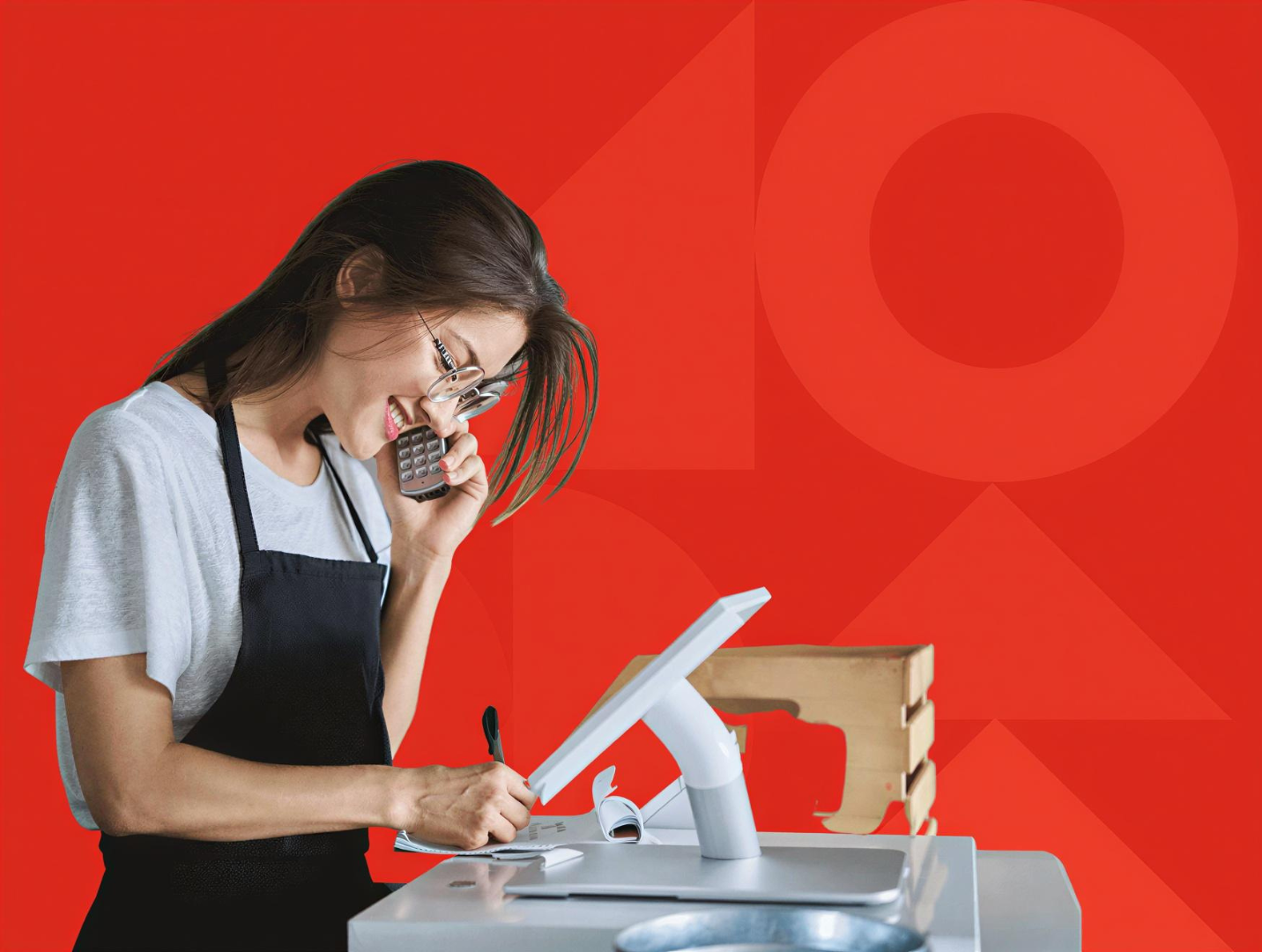 Singapore F&B owner at counter with Koomi Pay terminal
